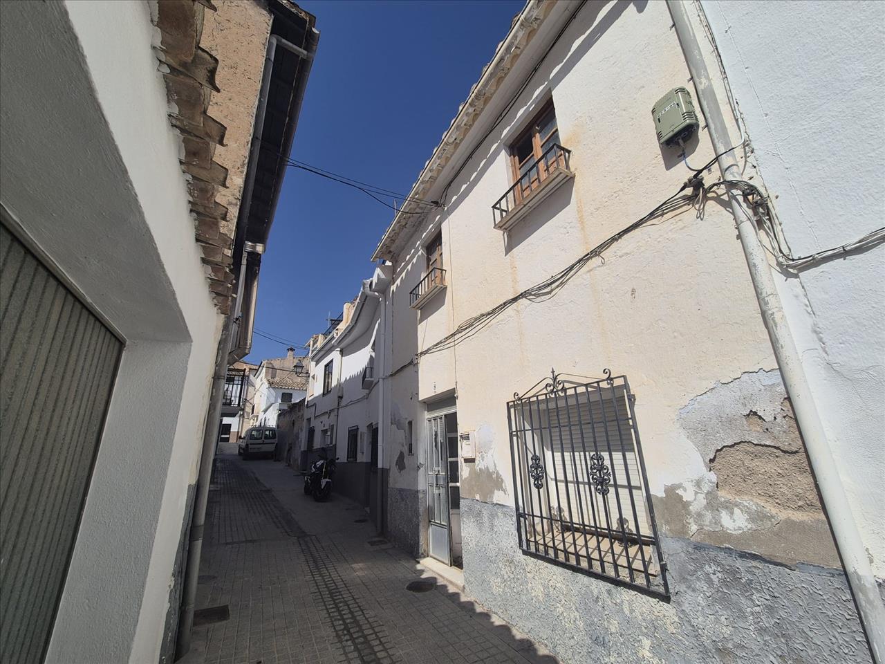 Casa adosada en CL Pozo